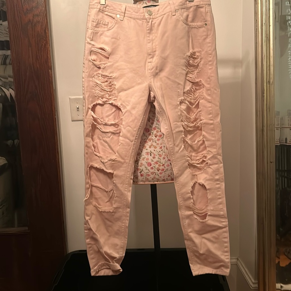NWT Misguided brand highly distressed jeans in light pink
